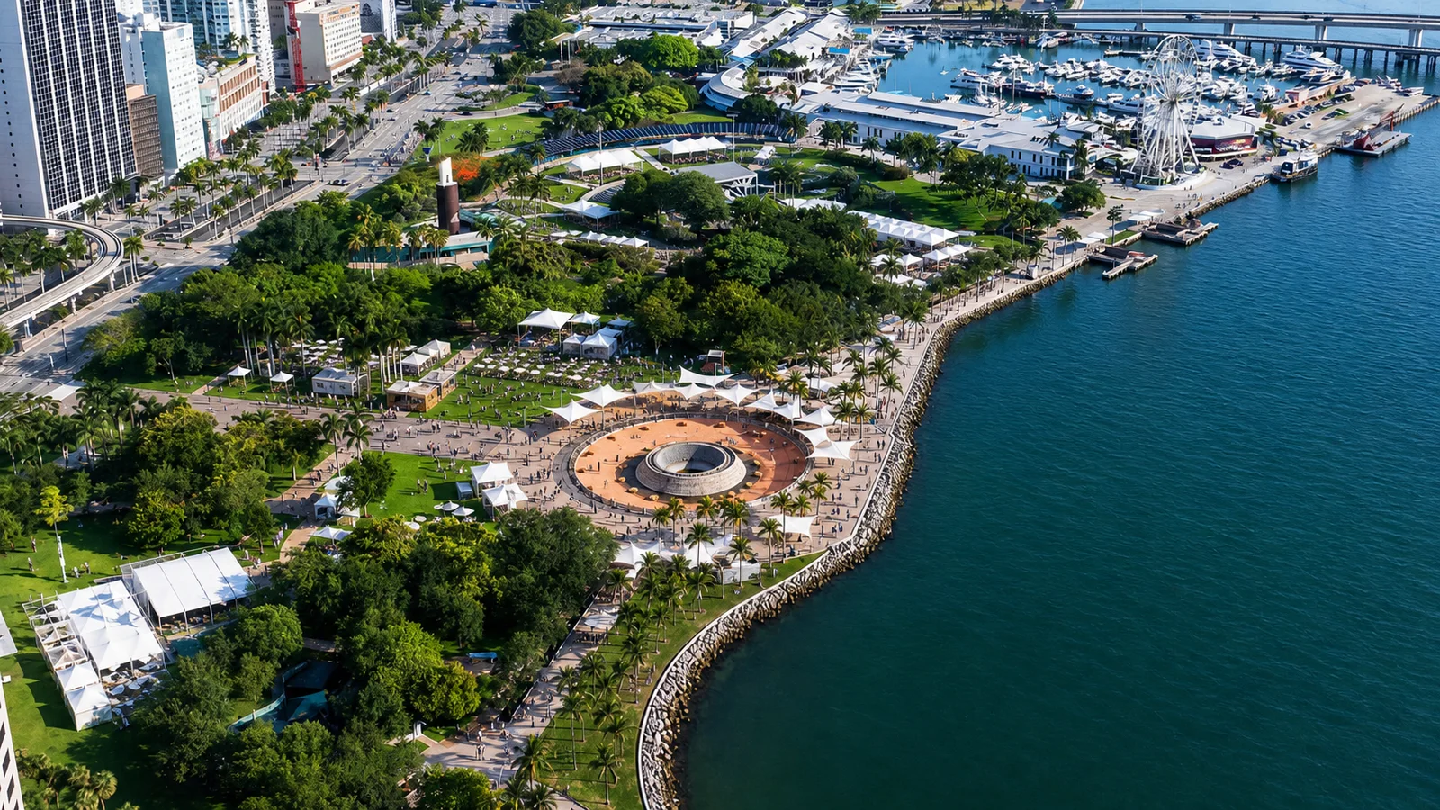 A source-grounded editorial aerial of the FIFA World Cup 2026 fan-festival setting at Bayfront Park with small event and hospitality zones.