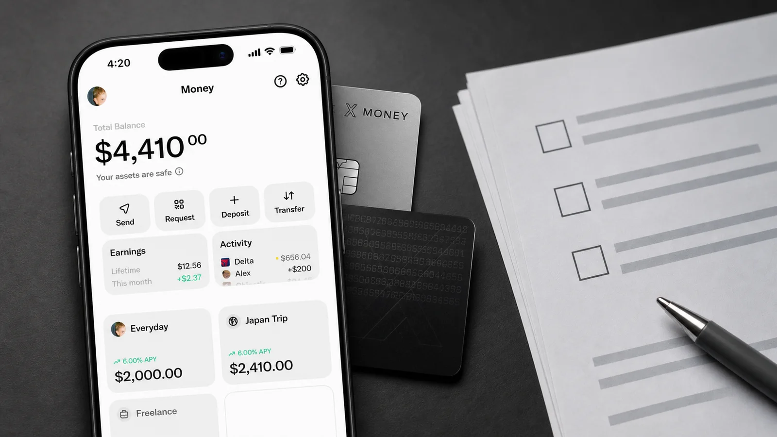 X Money phone and card near blank deposit paperwork and checklist items.