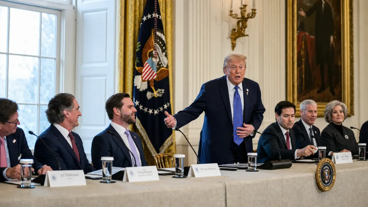 Donald Trump stands among U.S. officials at a White House roundtable with oil-industry executives