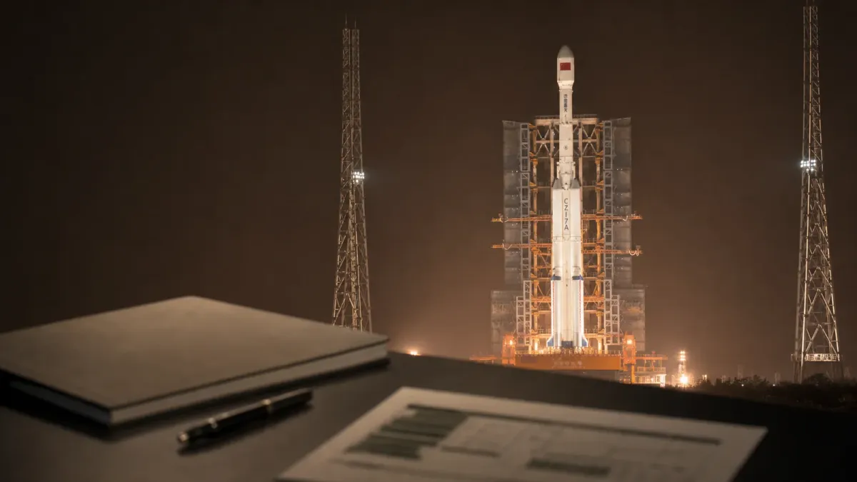 A source-grounded editorial view of a Long March 7A rocket with mission-review materials in the foreground.