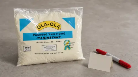 Ola-Ola Pounded Yam packaging shown on a neutral surface with the front label visible