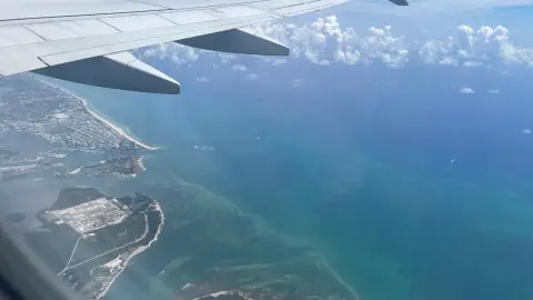 Virginia Key and Miami Beach seen from the air beside Biscayne Bay.